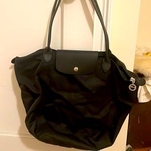 Barely used black long champ tote bag